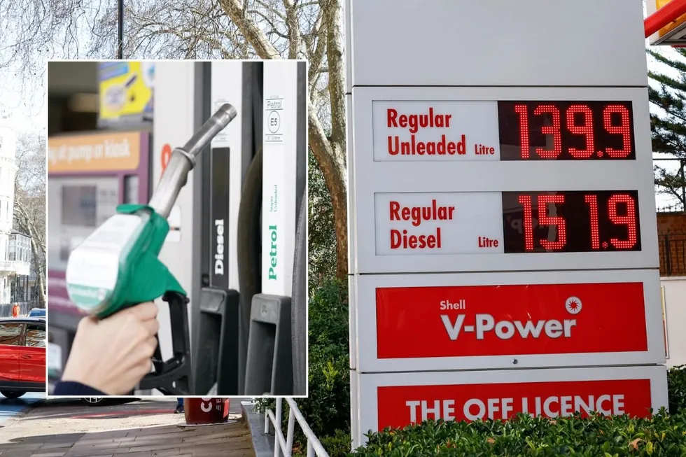 Petrol and diesel pumps and a fuel price sign in London