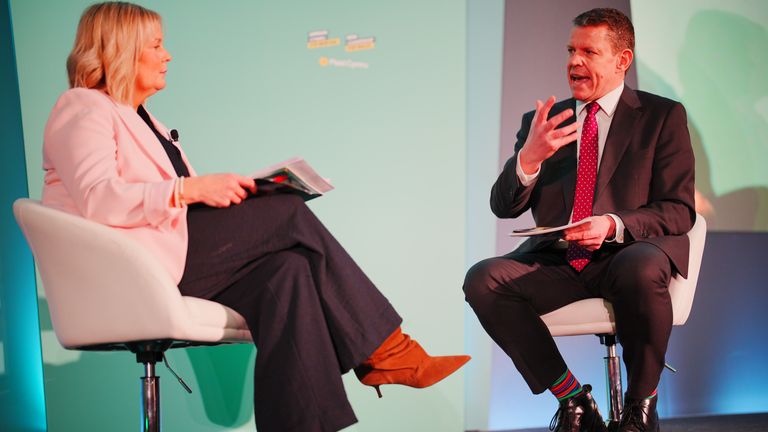 Rhun ap Iorwerth, Plaid Cymru leader, in discussions at the party's spring conference