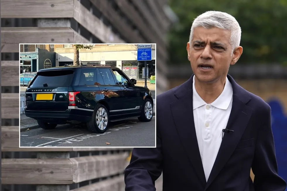 An SUV parked in London and London Mayor Sir Sadiq Khan