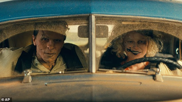 Christian Bale, left, and Jessie Buckley in a scene from The Bride!