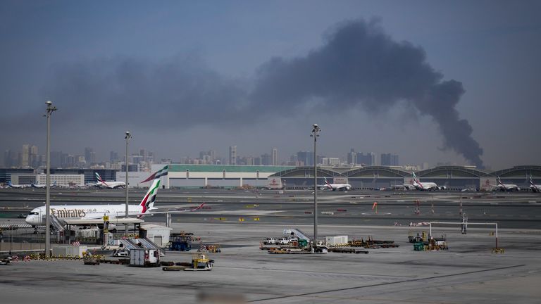 Emirates airplanes are parked at the Dubai International Airport after its closure. Pic: AP