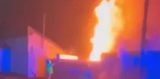 English football stadium set on fire in suspected arson attack as emergency services rush to the scene