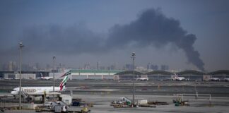 Thousands stranded as Iranian strikes force airports to close including Dubai and Doha | UK News